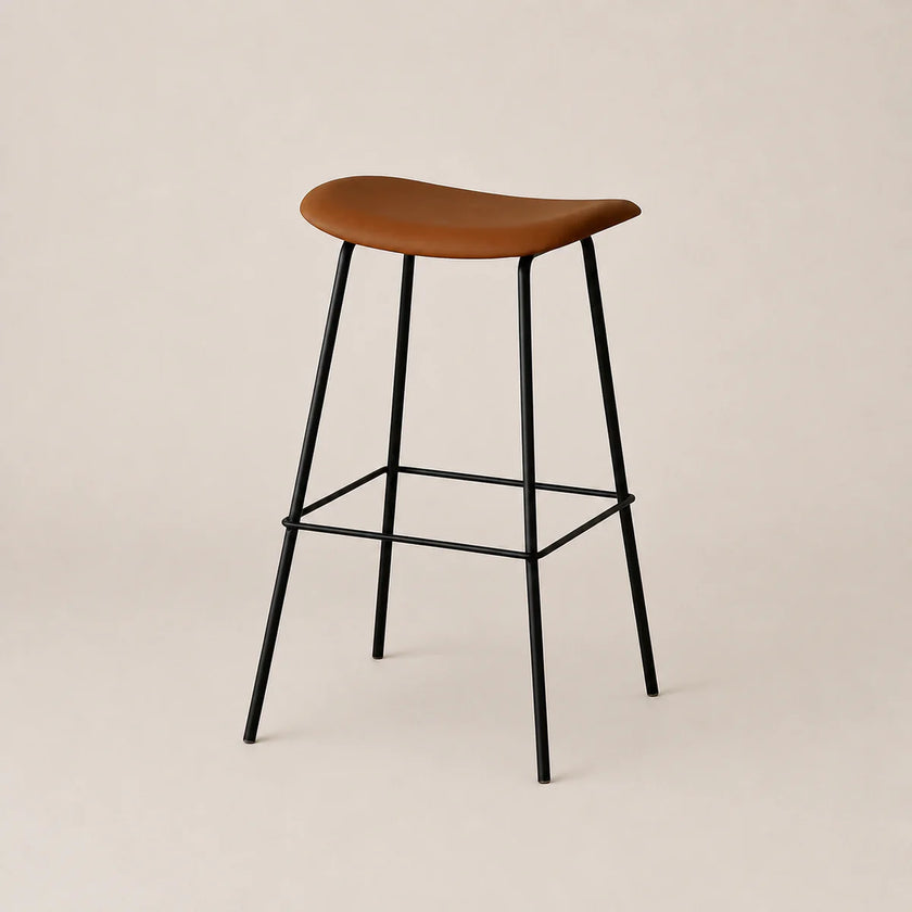 Bar stool with wooden seat and black metal legs on a beige background