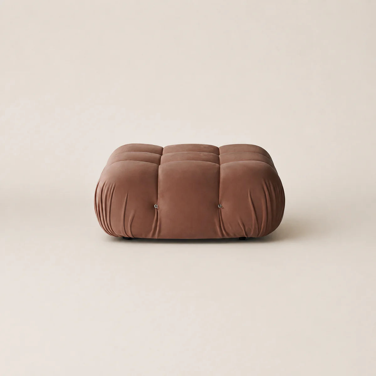 Brown cushion on a beige background