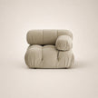 Beige armchair on a light beige background
