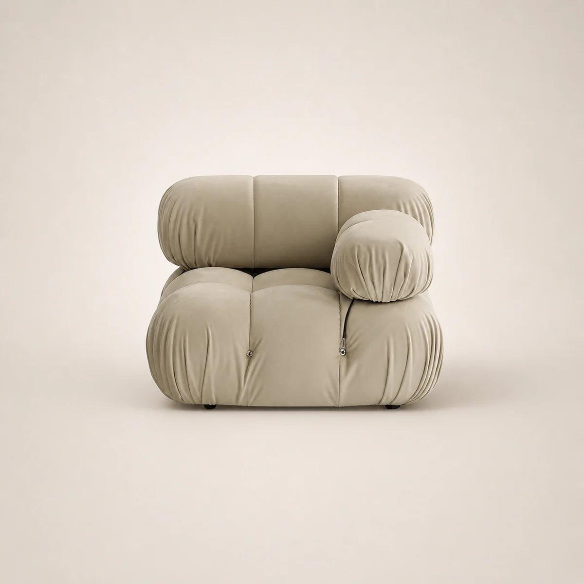 Beige armchair on a light beige background