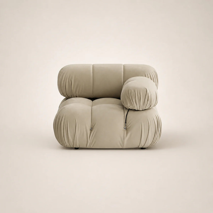 Beige armchair on a light beige background