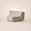 Modern gray sofa on a beige background