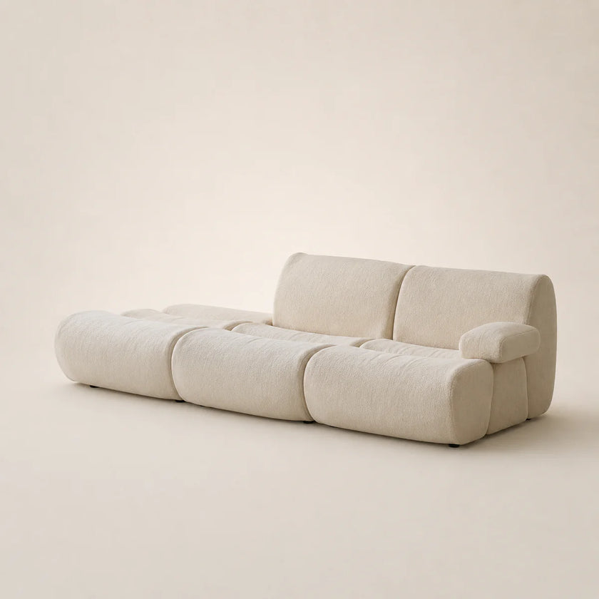Beige modular sofa on a beige background