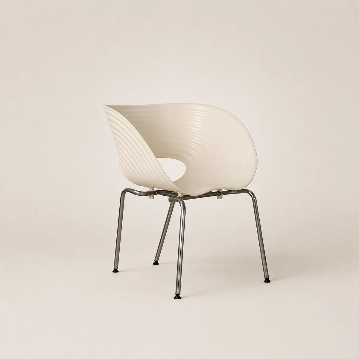 Modern chair with wavy design on a beige background