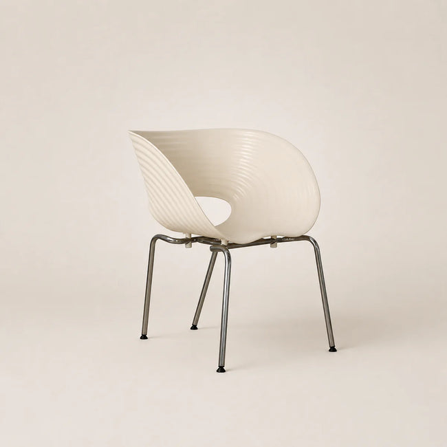 Modern chair with wavy design on a beige background