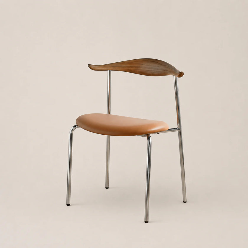 Chair with brown leather seat and backrest on a beige background
