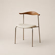 Chair with wooden backrest and white seat on a beige background