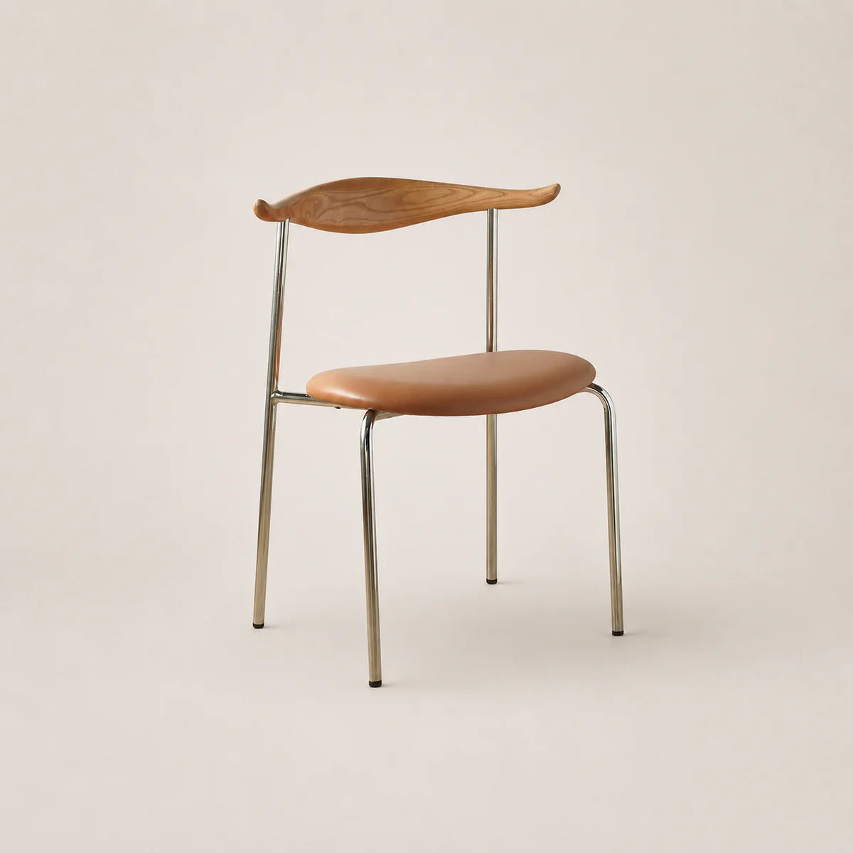 Chair with wooden backrest and seat on a beige background
