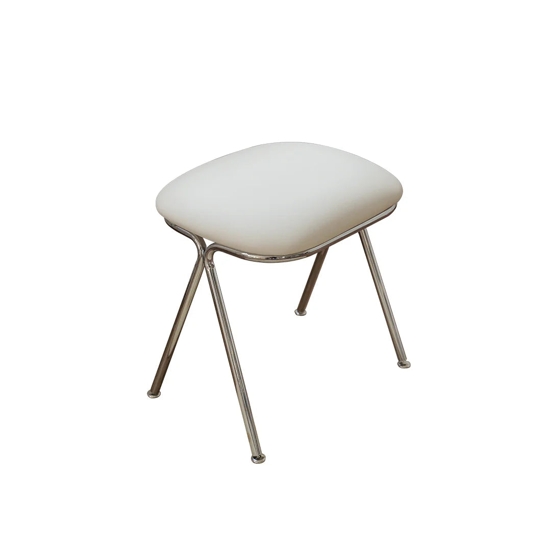 White cushioned stool with metal legs on a white background