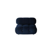 Navy blue armchair on a white background
