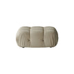 Beige cushion with a ribbed texture on a white background