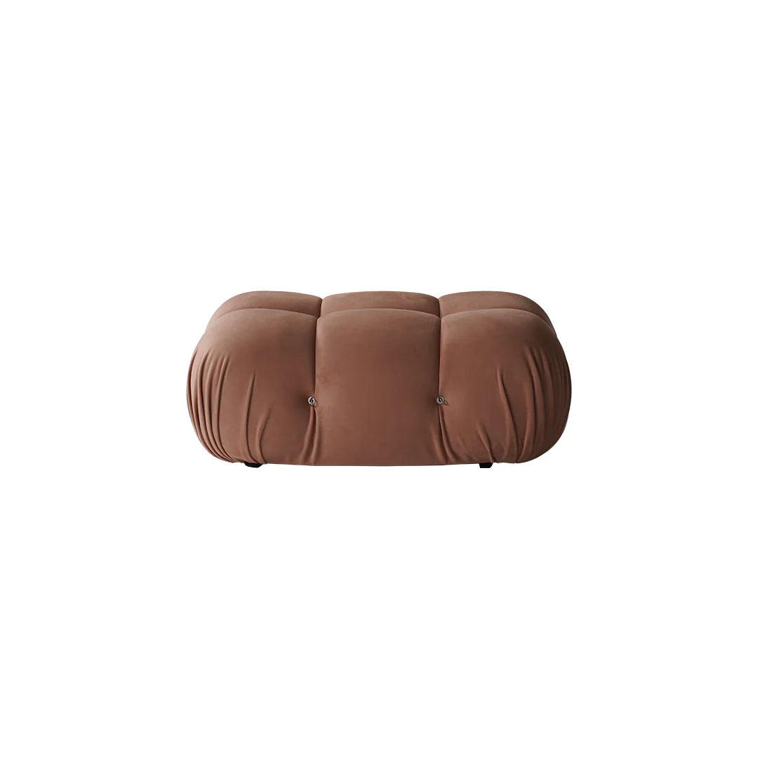 Brown cushioned ottoman on a white background