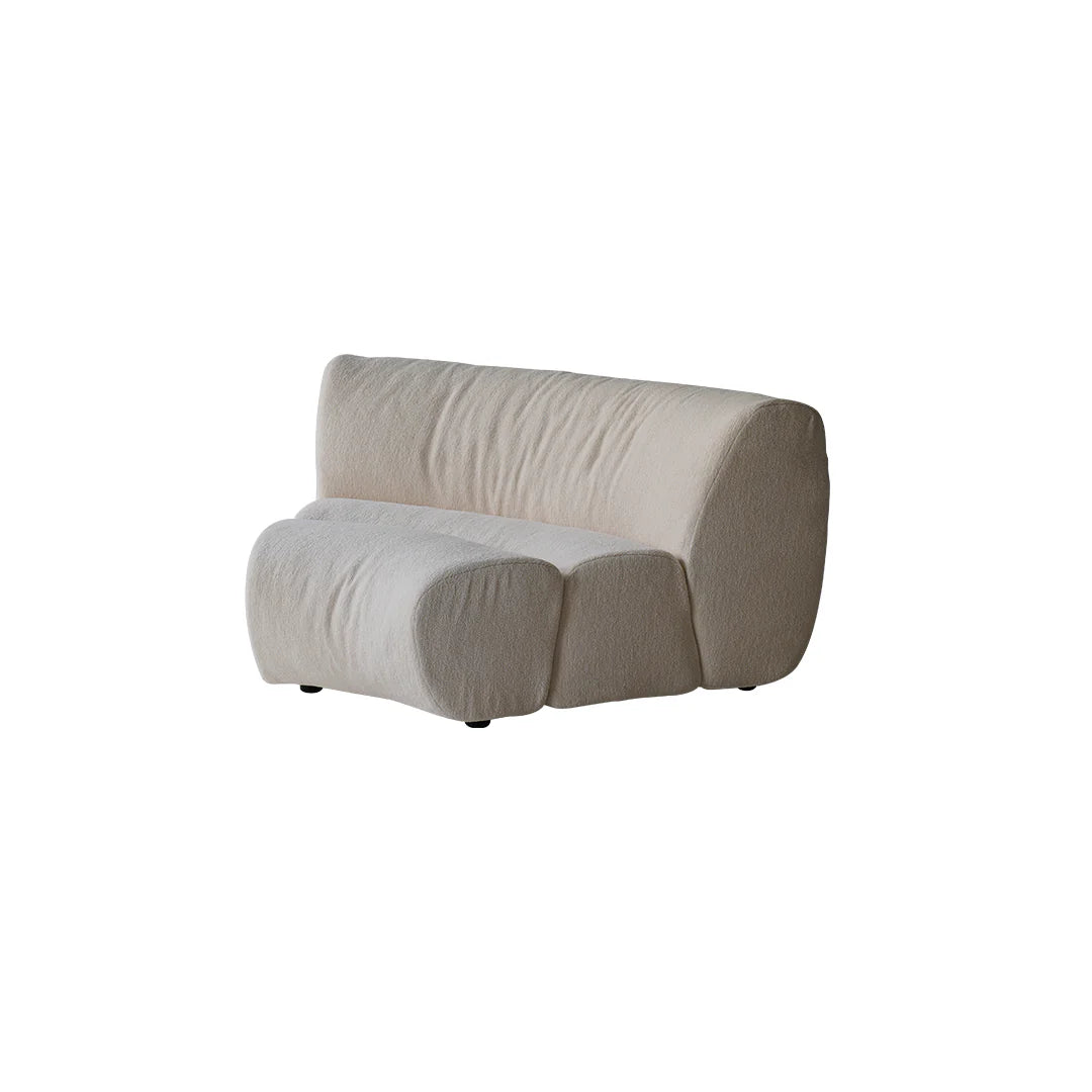 Modular sofa with curved design on a white background