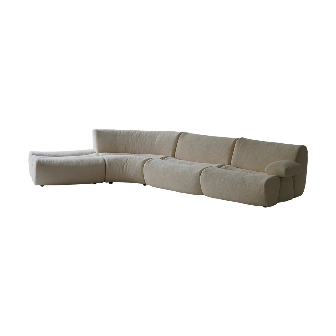 Beige sectional sofa on a white background