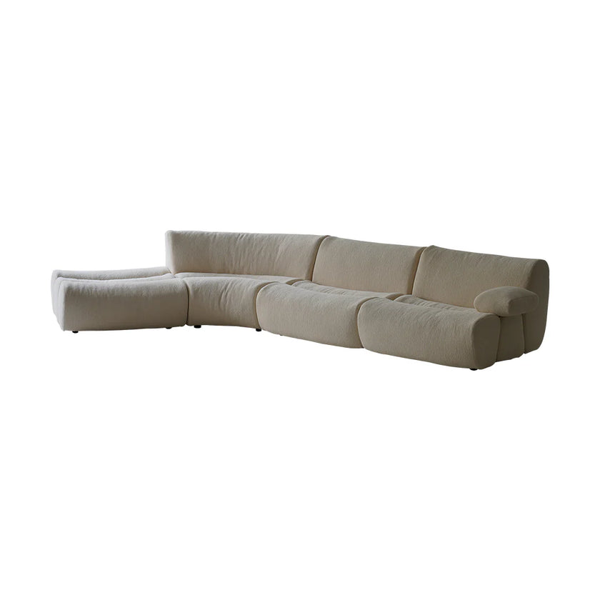 Beige sectional sofa on a white background