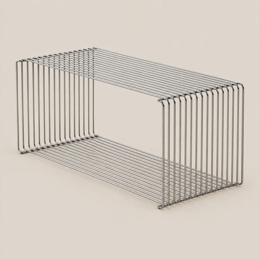 A rectangular metal wire storage basket with two tiers, shown on a solid light beige background.