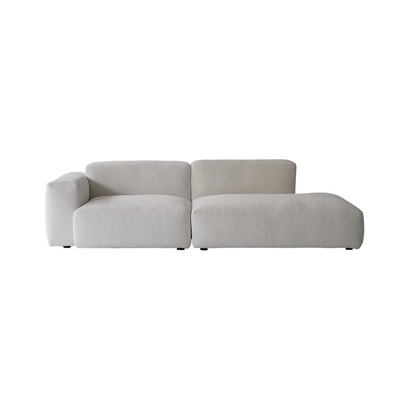 Light gray sectional sofa on a white background