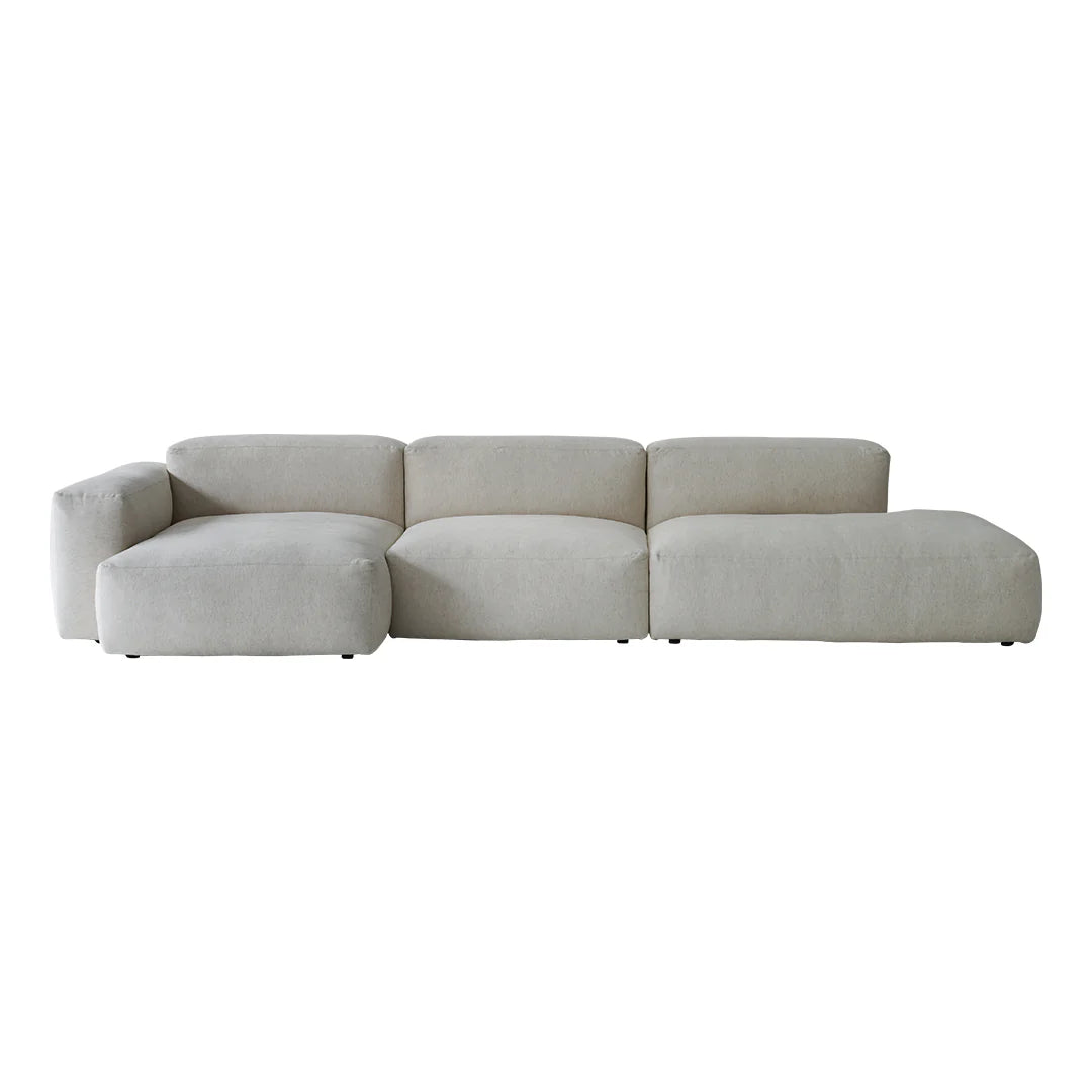 Beige sectional sofa on a white background