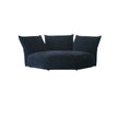 Modern navy blue sofa with three cushions on a white background