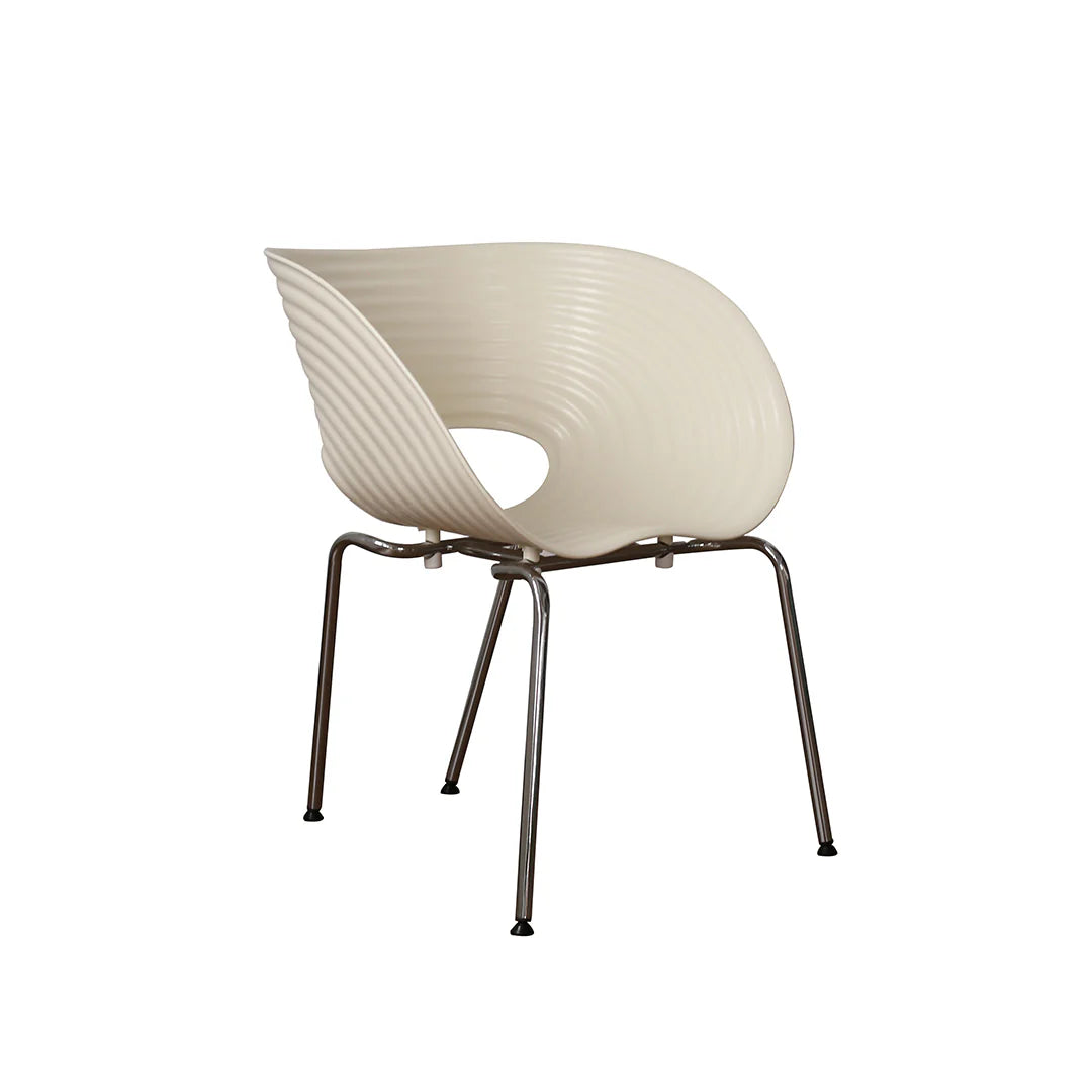 Modern chair with ribbed beige backrest and metal legs on a white background